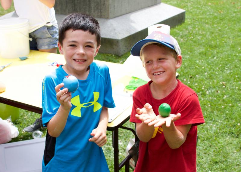 "The more you use it, the more it gets squishier," said Drew Butler, 6. Butler, left, and his friend Yashar Hosseinion, 5, made stress balls with flour and balloons at the library. BY GEORGIA SPARLING